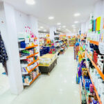 Supermarket display racks by Bharat Display Solution – wall-mounted grocery store shelving for retail stores