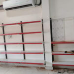 Wall mount display rack for retail store with strong metal frame for space-saving product display